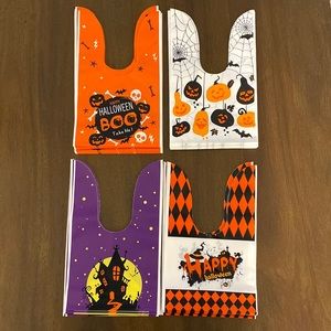 NWOT 100 Plastic Halloween Treat Favor Bags (25 per design)